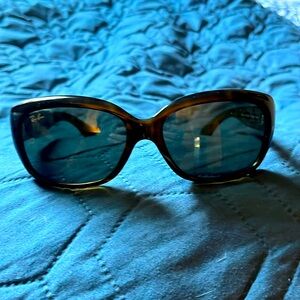 Brand new woman’s Ray-ban sunglasses with case. Color is Havana